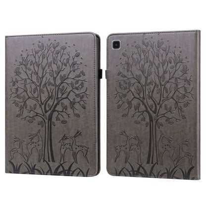 Grey embossed leather tablet case with tree and deer pattern, foldover cover