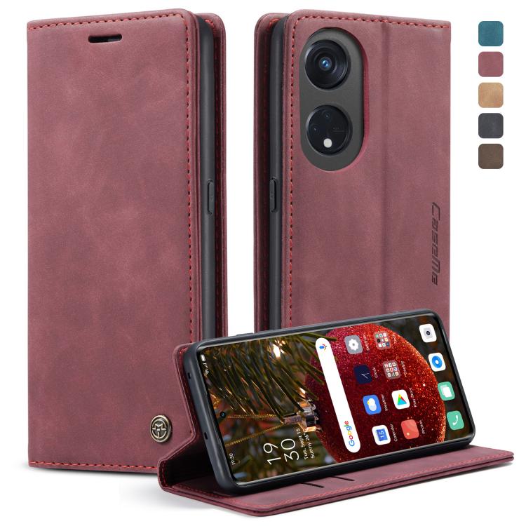Wine red leather flip phone case with stitched edges, camera cutout, and stand