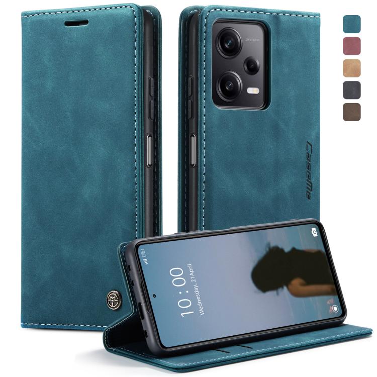 Teal blue leather flip phone case with viewing stand and cutouts for camera