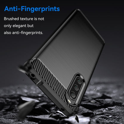 Black brushed texture TPU phone case with carbon fiber pattern and three camera openings