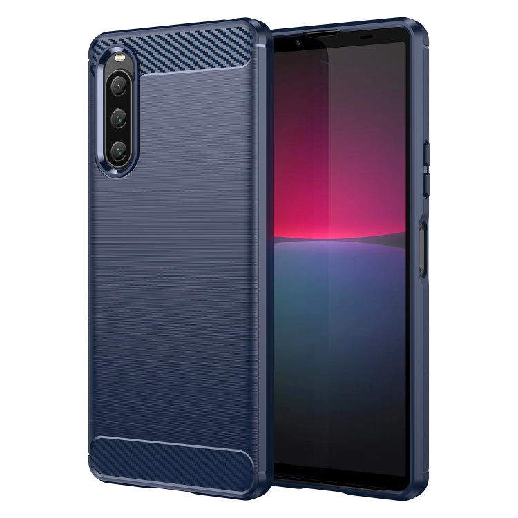 Blue brushed texture TPU phone case with carbon fiber look trim and camera cutouts