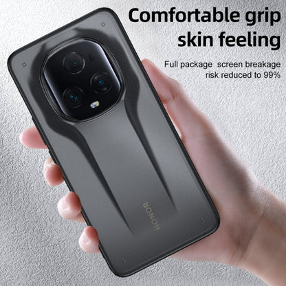 Matte black phone case held in hand with textured grip and camera opening