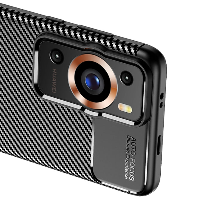 Black carbon-fiber textured TPU phone case with camera ring detail and button cutouts.
