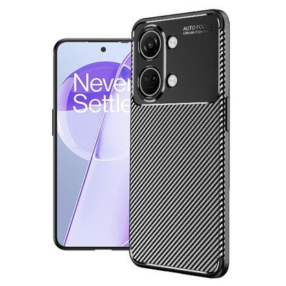 Black carbon-fiber textured TPU phone case with camera cutouts and edge protection.