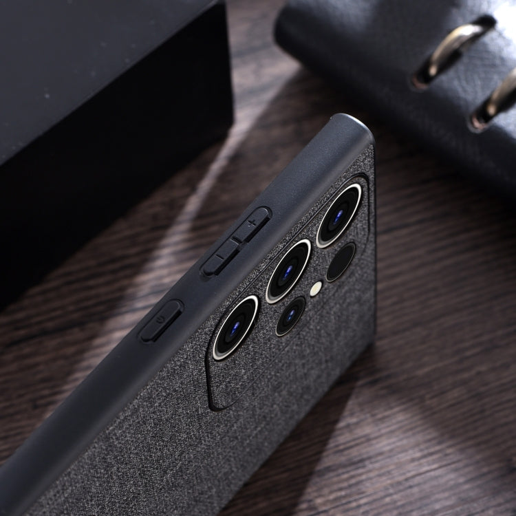 Grey cloth-texture phone case side view with button and port openings