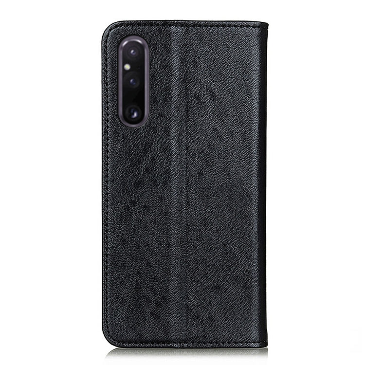 Black textured leather phone case with camera cutout on the back