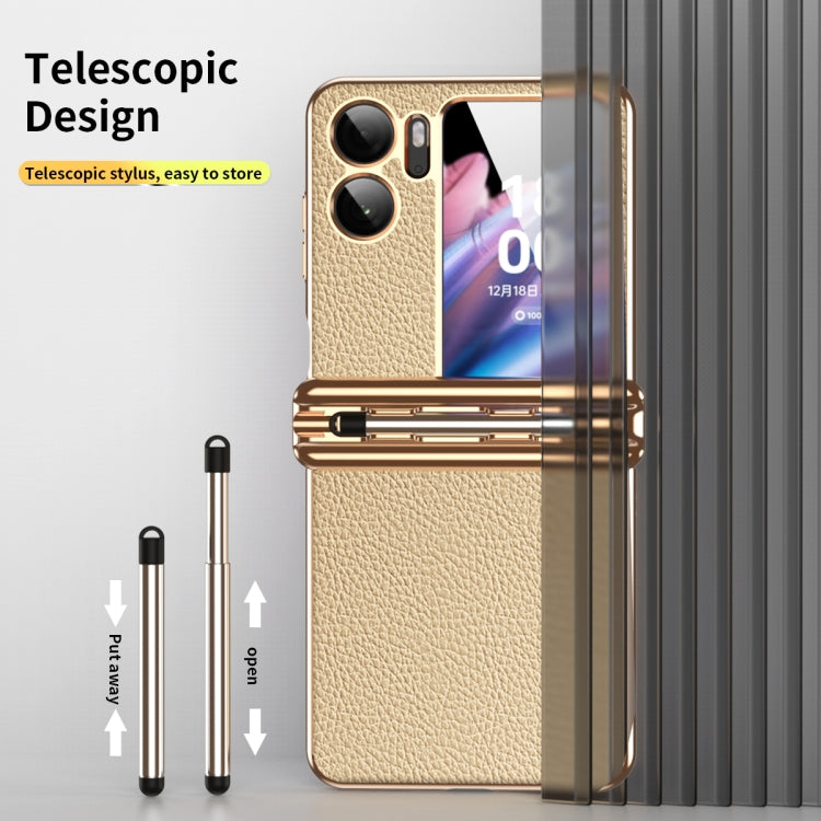 Beige hinged phone case with telescopic pen design and gold-tone hinge