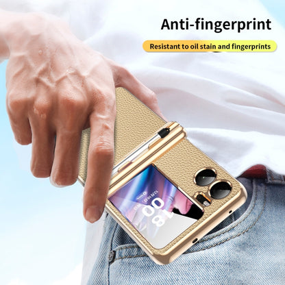 Beige leather-look hinged phone case with pen slot, held in hand
