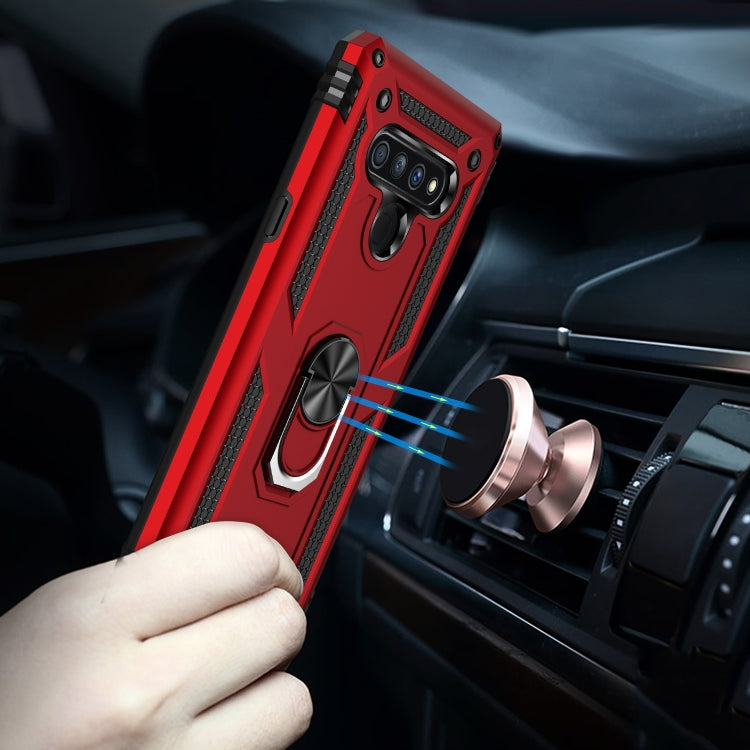 Red LG Stylo 6 protective case with metal ring kickstand attached in car