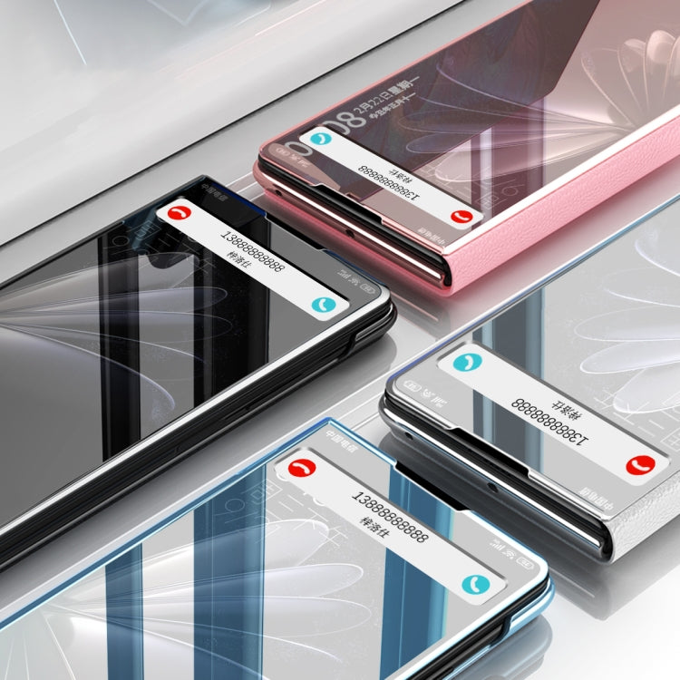 Mirror leather phone case with stand, showing ports and camera cutouts on blue and pink