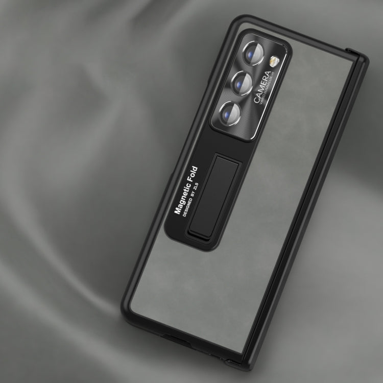 Folding phone case close-up with camera cutouts and side button cutout, dark color.