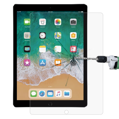 Tempered glass screen protector film for a tablet, aligned to cover the display