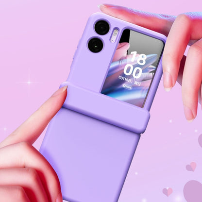 Lavender magnetic hinge phone case with protective film, hands holding the folded case