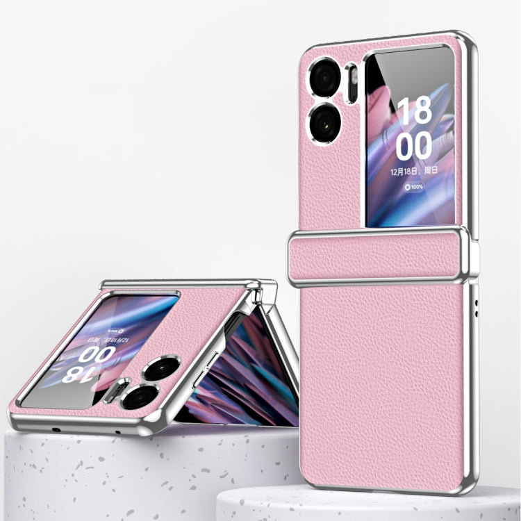 Pink magnetic flip phone case with textured litchi pattern and metal frame edge