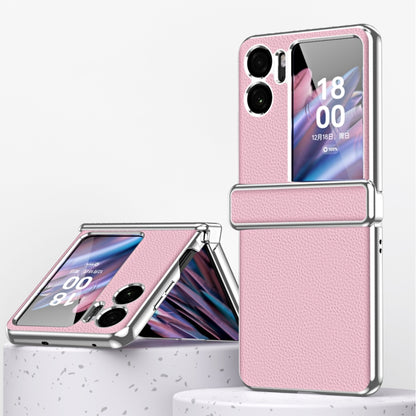 Pink magnetic flip phone case with textured litchi pattern and metal frame edge