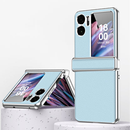 Blue magnetic flip phone case with textured litchi pattern and metal frame edge
