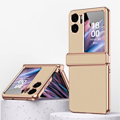 Champagne gold magnetic flip phone case with textured litchi pattern and metal frame