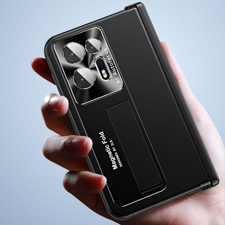 Black folding phone case held in hand with pen slot and camera cutout