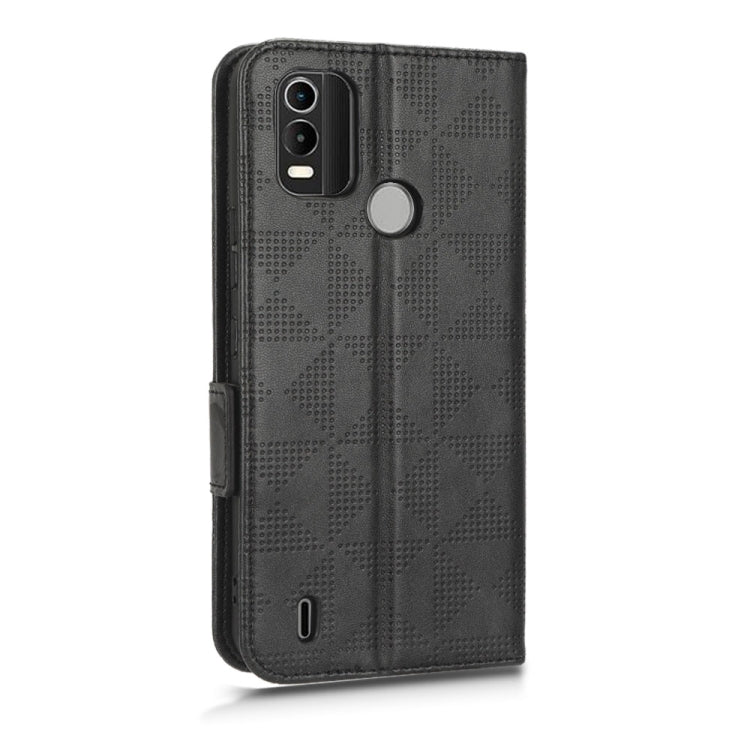 Black folio phone case with symmetric triangle pattern; cutouts for camera and buttons