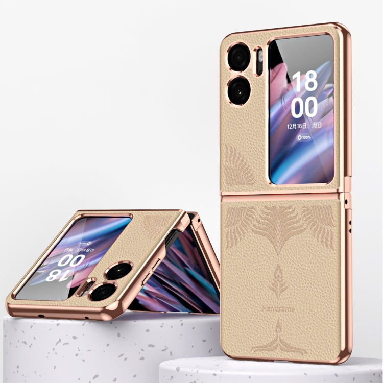 Champagne gold fold phone case with electroplated frame and embossed leaf pattern.