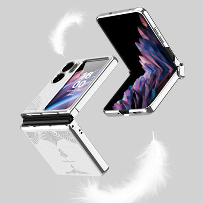 Silver fold phone case with embossed leaf pattern, electroplated frame, and hinge design.