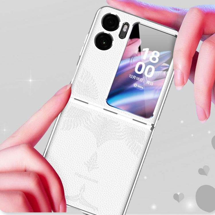 White fold phone case with embossed leaf texture, held in hands, showing camera cutouts.