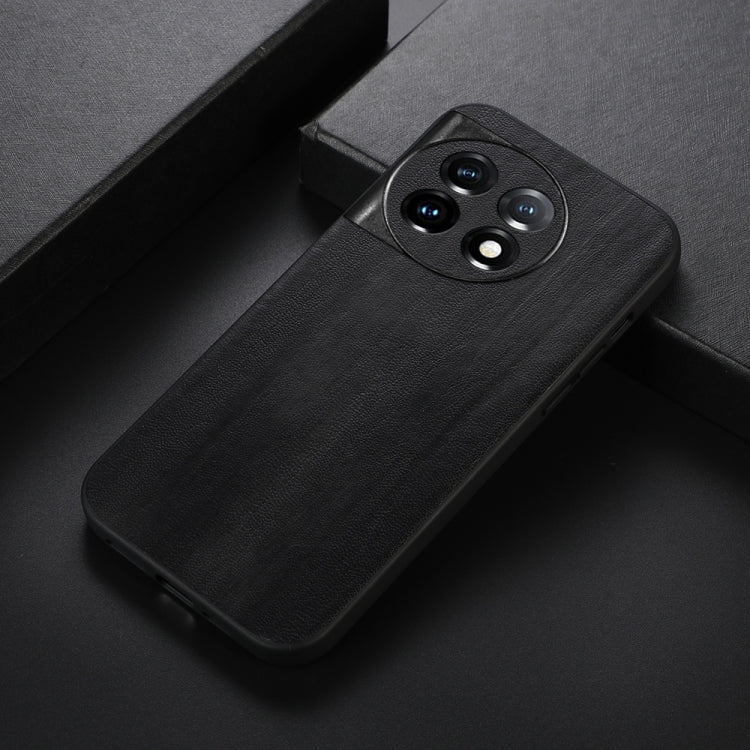 Black PU texture phone case, angled view, with camera cutout and raised lens rim