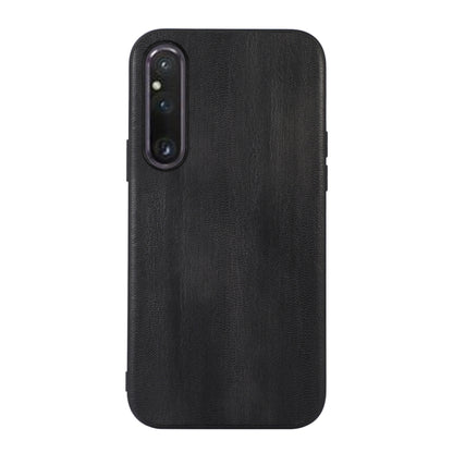 Black PU texture phone case back, with single camera cutout and side button openings
