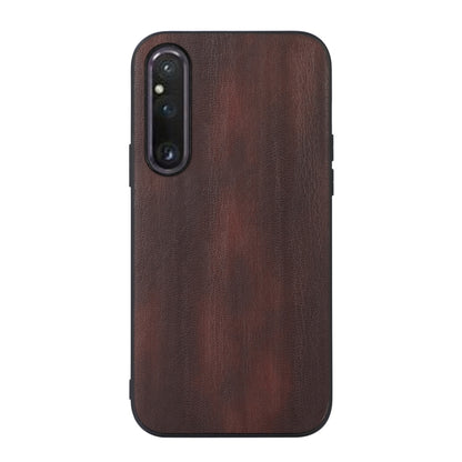Brown textured PU phone case with raised camera cutout