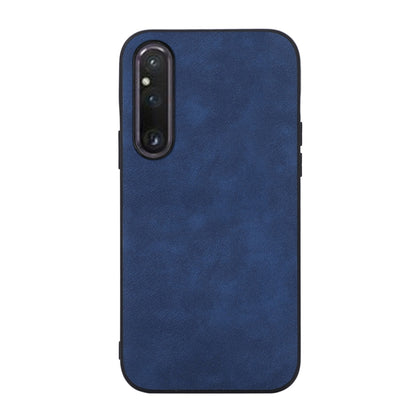 Blue PU phone case with Morocco-style textured finish and single camera cutout.