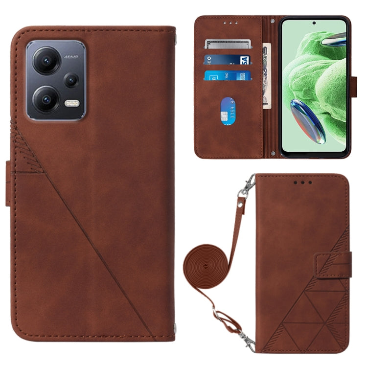 Brown 3D embossed leather flip phone case with crossbody strap, card slots