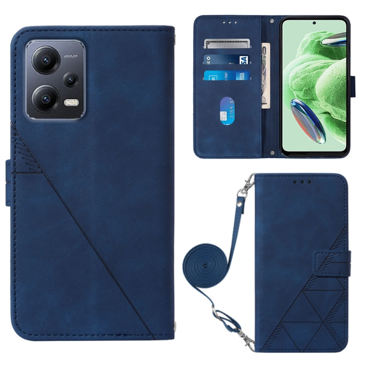 Blue 3D embossed leather flip phone case with crossbody strap and card slots