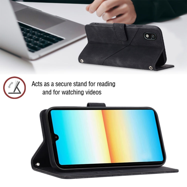 Black embossed leather folio phone case propped as a viewing stand