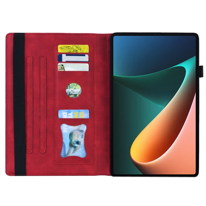 Red leather flip tablet case with built-in card pockets and viewing stand