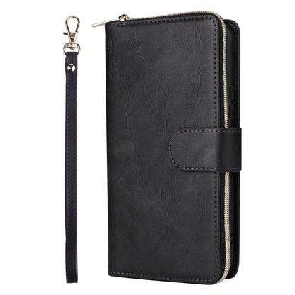 Black leather phone wallet case with zipper, wrist strap, and folio-style card pocket.