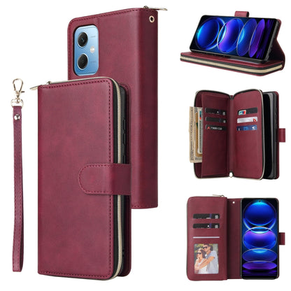 Wine red leather zipper phone wallet with card slots, wrist strap, and opened compartments