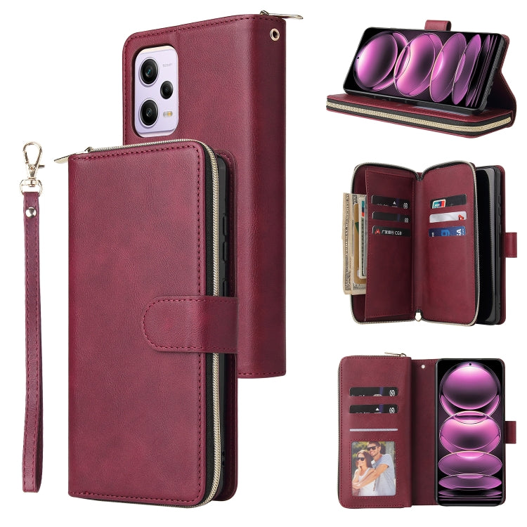 Wine red leather zipper phone wallet with card slots and wrist strap, phone shown in front