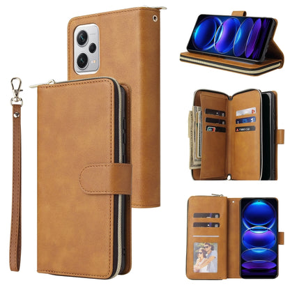 Tan leather zipper phone wallet with card slots, wrist strap, and front phone holder