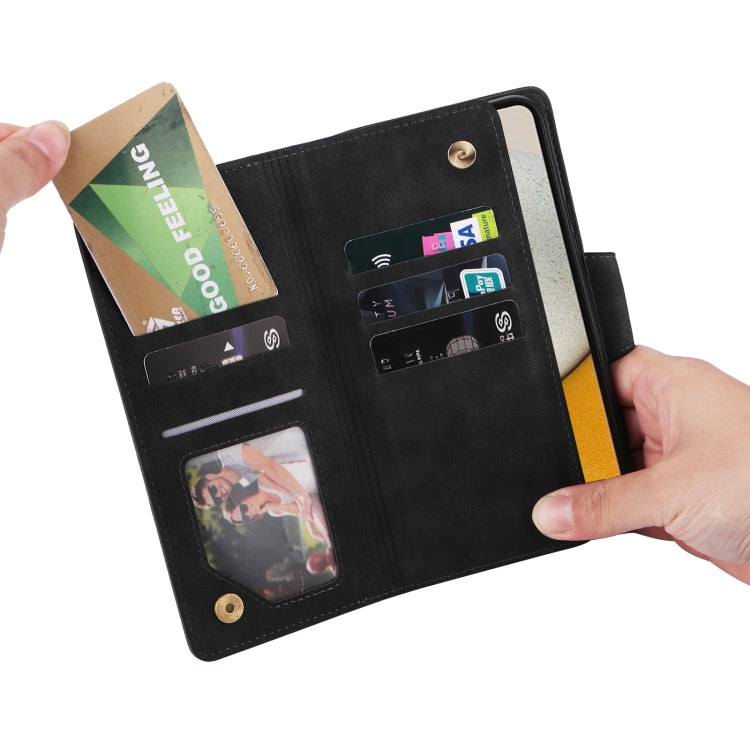 Black leather wallet-style phone case showing 9 card slots and snap closure