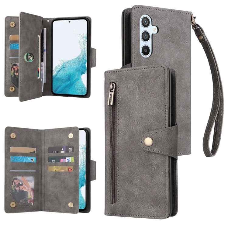 Grey three-fold leather phone wallet with card slots, wrist strap, and snap card holder