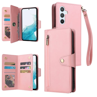 Pink three-fold leather phone case with card slots and wrist strap, front open