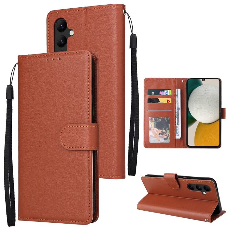 Brown leather wallet phone case with 3 card slots and wrist strap
