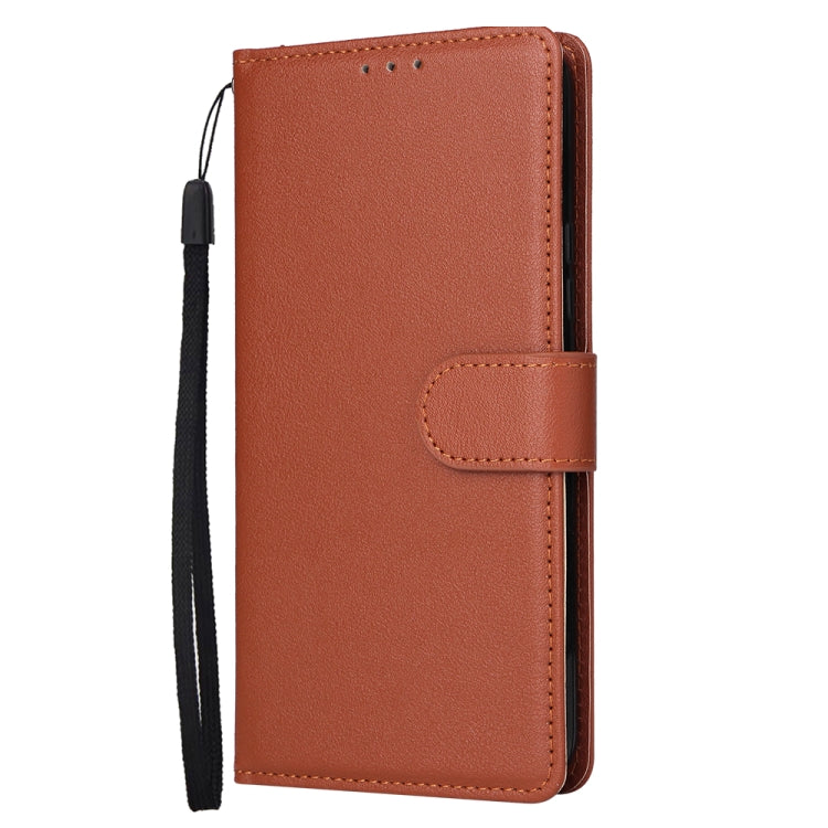Brown leather phone wallet case with folio cover and card holder strap