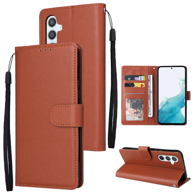Brown leather wallet phone case with 3 card slots and wrist strap