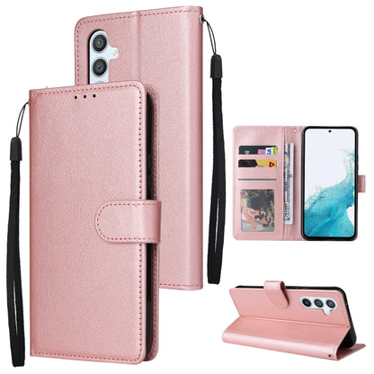 Rose pink leather-style phone wallet case with 3 card slots and fold-out kickstand, wrist strap