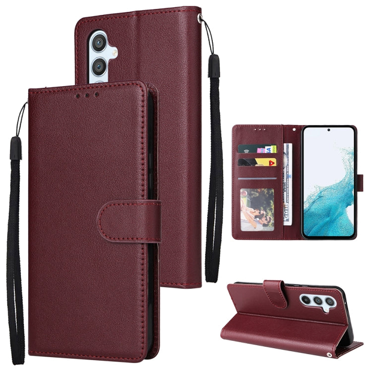 Wine red leather-style phone wallet case with 3 card slots and fold-out kickstand, wrist strap