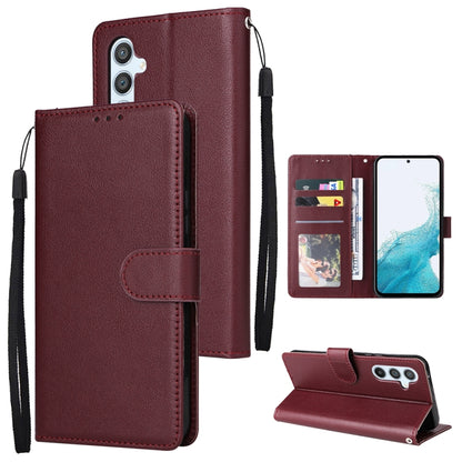 Wine red leather-style phone wallet case with 3 card slots and fold-out kickstand, wrist strap