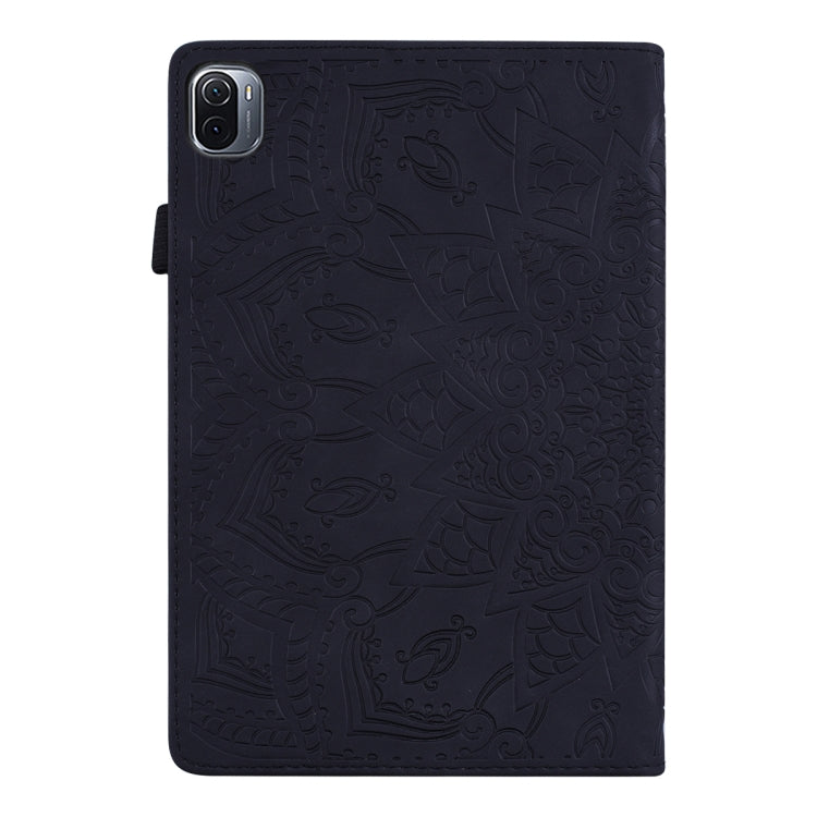 Black embossed leather tablet flip case with camera cutout on back cover.