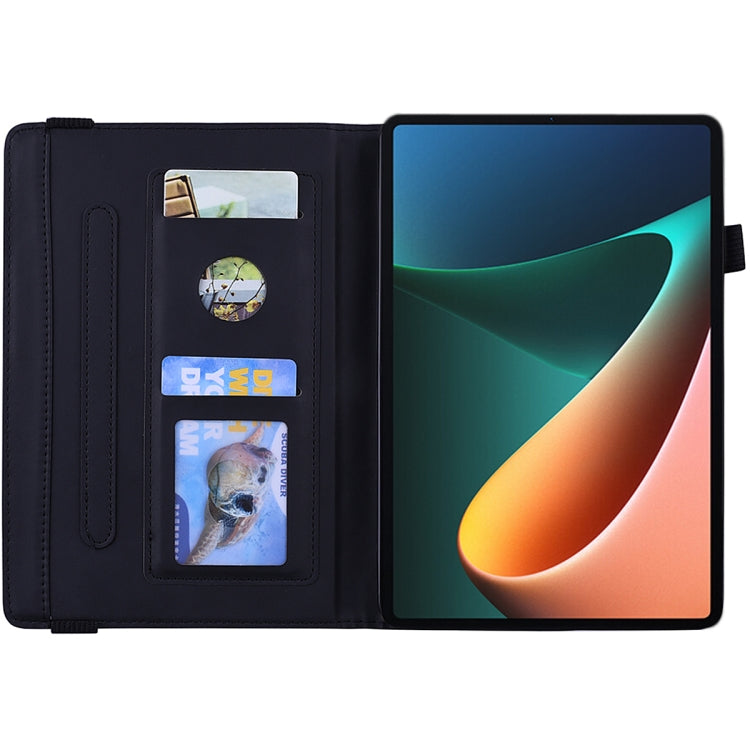 Black embossed leather flip case open view with card slots and stand support.