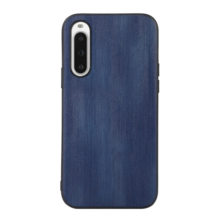Blue PU phone case with cow texture, raised camera cutout, for OPPO phones